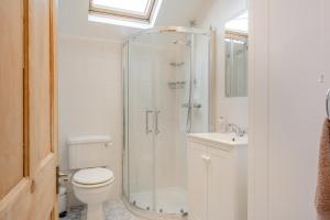 a bathroom with a shower and a toilet and a sink at 2 Bed in Bembridge oc-p34174 in Bembridge +27 photos
