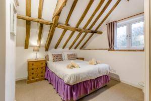 a bedroom with a bed and a window at 3 Bed in Stratton Strawless oc-w34832 in Stratton Strawless +38 photos