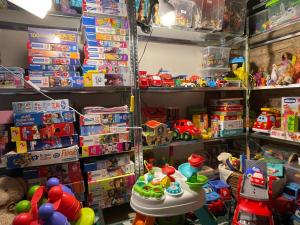 a toy store filled with lots of toys at Agriturismo Vernianello in Poggibonsi +40 photos