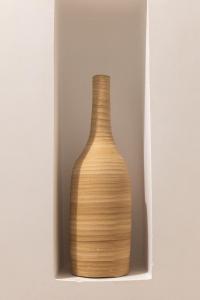 a wooden vase in a shelf in a wall at Summer Villa in Adamantas +32 photos