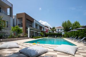 an image of a swimming pool in a house at Oikos Apartment in Hanioti