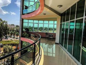 arium view of a building with a spiral staircase at Delano Hotel in Bahir Dar
