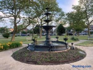 a fountain in the middle of a park at The Melrose in Ocean Grove