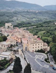 an aerial view of a small town with a street at Il Giardino di Luna in Poggio Nativo