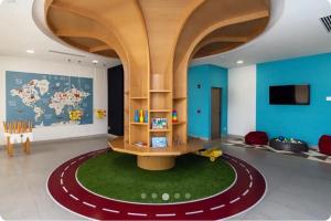a room with a toy track on the floor at Apartment in Torre Empiria in Torreón