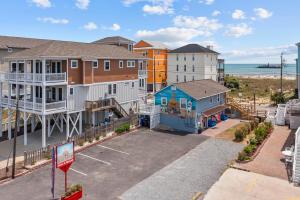 an aerial view of houses and a parking lot at Vitamin Sea Suites 2 in Carolina Beach