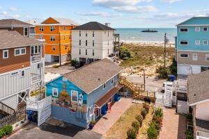 an aerial view of a city with houses and the beach at Vitamin Sea Suites 2 in Carolina Beach