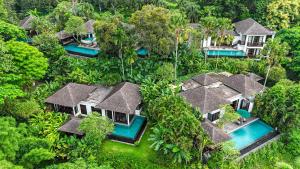 an aerial view of a resort in the jungle at The Damai in Lovina