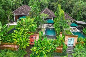 an aerial view of a resort with a swimming pool at The Damai in Lovina
