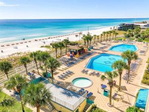 an aerial view of a resort with a pool and the beach at Oceanfront Condo #507 at Summit Beach Resort in Panama City Beach