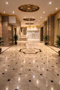 a lobby with a marble floor and a building at River Nile Edge Boutique Hotel & Restaurant in Cairo