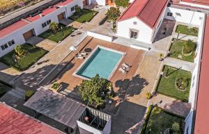 an overhead view of a swimming pool in a building at Centro Vacacional Atlixco-Metepec in Atlixco