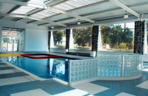 a pool in a building with water in it at Centro Vacacional Atlixco-Metepec in Atlixco