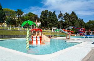 a pool with a water park with slides at Centro Vacacional Atlixco-Metepec in Atlixco