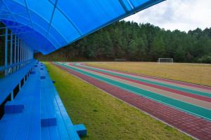 a row of benches in a race track at Centro Vacacional Malintzi in Guadalupe +15 photos