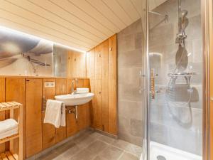 a bathroom with a shower and a sink at Spykerhütte in Rauris +49 photos