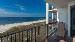 a balcony with a view of the beach at Phoenix VI 61204 in Orange Beach +55 photos