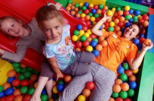 three children playing in a pool of balls at VVF Saint-Lary-Soulan Hautes-Pyrénées in Saint-Lary-Soulan +15 photos