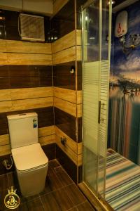 a bathroom with a toilet and a shower at T P Villas in Nilaveli +36 photos
