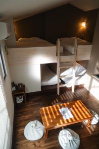 an overhead view of a room with two bunk beds at Condominium MIRAHAKONE in Hakone