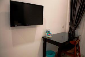 TV a/nebo společenská místnost v ubytování Austin GuestHouse