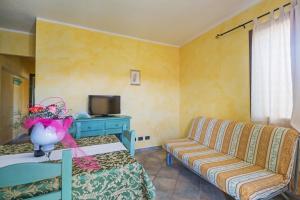 TV a/nebo společenská místnost v ubytování Albergo Residenziale Gli Ontani