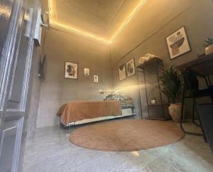 a bedroom with a bed in a room at Residence 168 in Gununganjar