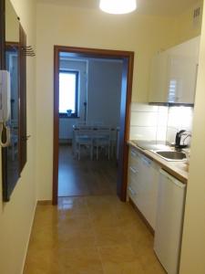 Kuchyňa alebo kuchynka v ubytovaní Apartament Akuratny Zakopane