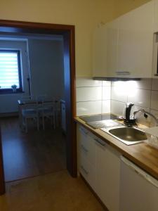 Kuchyňa alebo kuchynka v ubytovaní Apartament Akuratny Zakopane