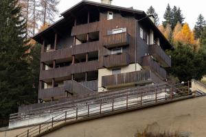 a building on the side of a river at Oga View Apartment in Oga