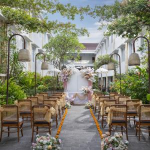 an aisle at a wedding at the mandarin oriental singapore at Crystalkuta Hotel - Bali in Kuta