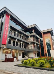 a large building with a lot of balconies at vaznest in Nilambūr