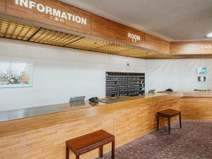 a waiting room with a sign that reads information room at Kanazawa Kokusai Hotel in Kanazawa +64 photos
