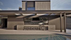 a rendering of a house with a patio and a pool at Neme Slow Living Retreat in Rethymno