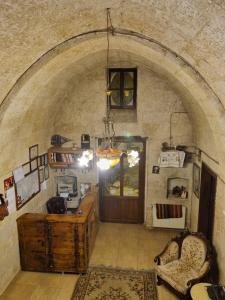 a large room with an archway in a building at Born Hotel in Ürgüp
