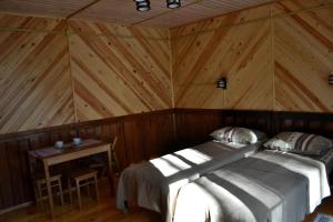 Кровать или кровати в номере Sandal guest house
