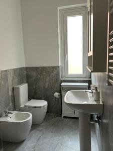 a bathroom with a toilet and a sink at Casa Natalina in Monterosso al Mare +41 photos