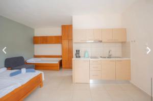 Gallery image of Geni Garden Apartments in Yénion