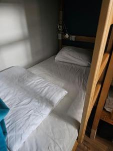 a couple of bunk beds in a room at Hostel Hostel in Batumi