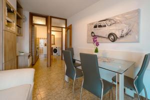 a dining room with a table and chairs at House Carla in Bellano