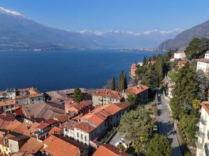 an aerial view of a town next to a body of water at House Carla in Bellano