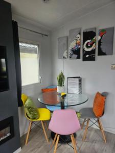 a dining room with a table and chairs at Ruth's Rest Shropshire Country Retreat with private Hot Tub & Views countryside in Shrewsbury +38 photos