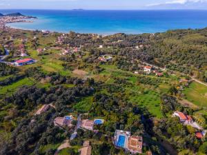 an aerial view of a house and the ocean at Villa Irida by Elayan Villas Corfu in Sidari