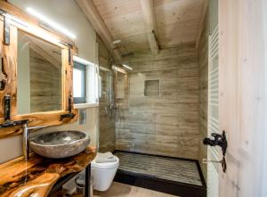 a bathroom with a sink and a shower at Villa Irida by Elayan Villas Corfu in Sidari +20 photos