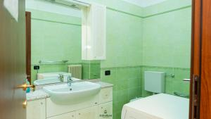 a bathroom with a sink and a toilet at I Portici - Cernobbio in Cernobbio +70 photos