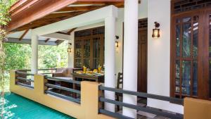 an outdoor dining area of a house at Green leaf Villa in Dambulla