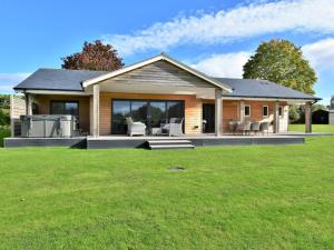 a house with a large lawn in front of it at 4 Bed in Oswestry oc-74110 in Kinnerley