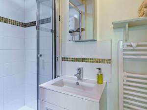 a bathroom with a sink and a shower at 2 Bed in Lampeter oc-43293 in Tregaron +24 photos