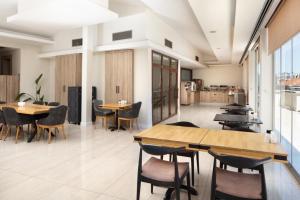 a restaurant with tables and chairs in a room at Atik Hotel Nişantaşı in Istanbul +29 photos