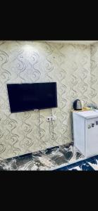 a wall with a tv on a wall at Nera Otel in Istanbul +12 photos